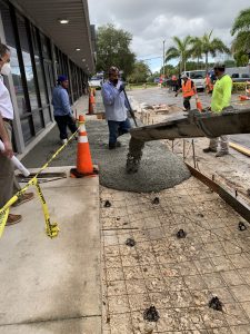 Concrete sidewalk being built scaled